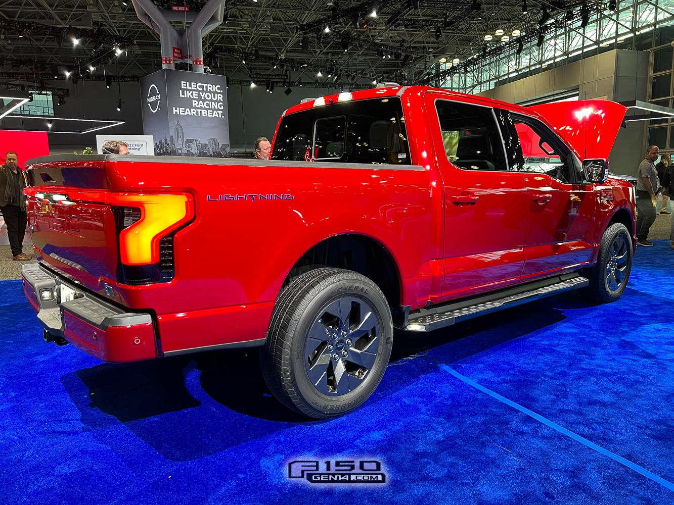 Ford F-150 Lightning RAPID RED F-150 Lightning Photos & Club rapid-red-f150-lightning-nyias-2022-1