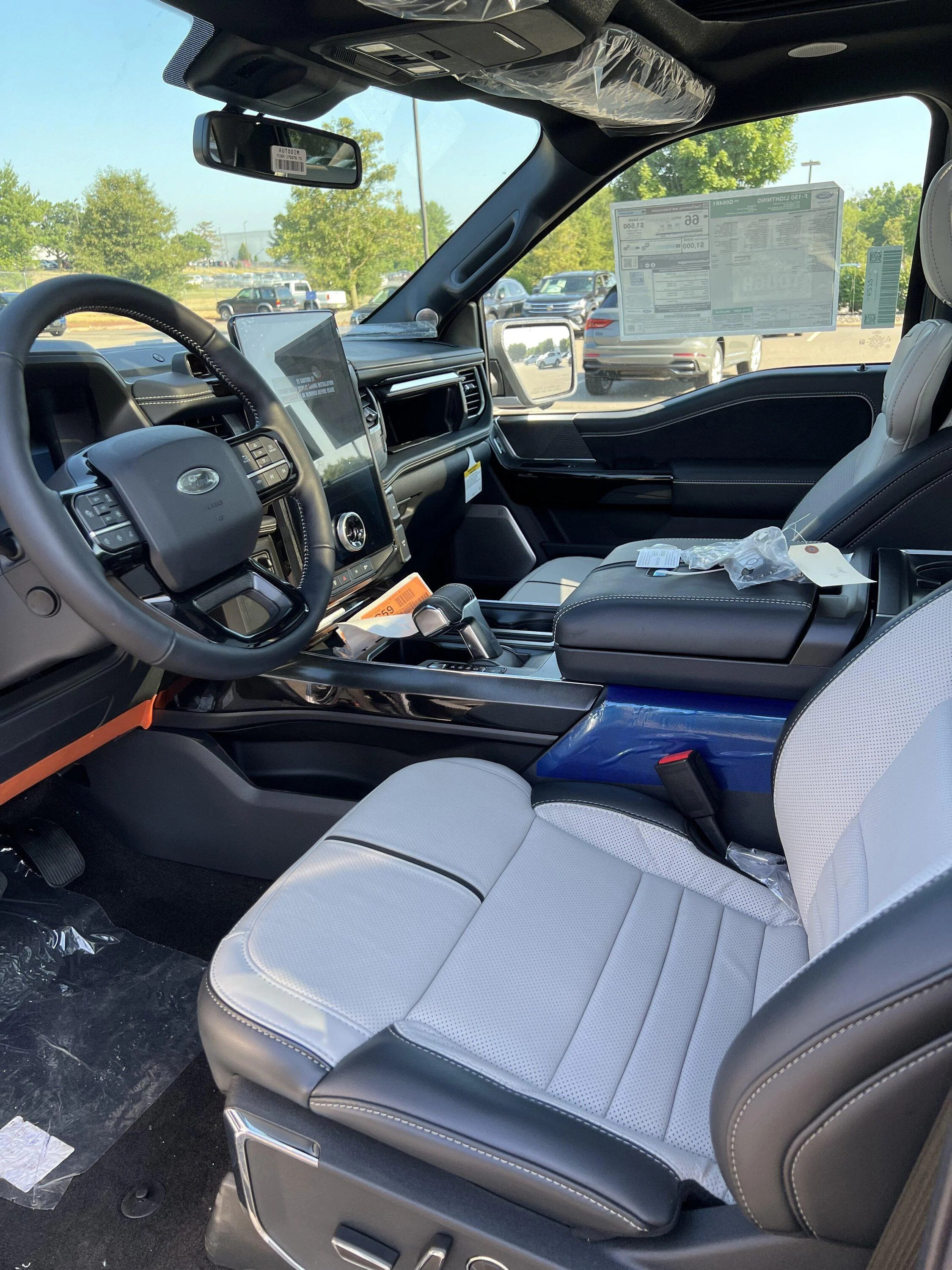 Ford F-150 Lightning White leather - how to minimize the transfer of color to it (i.e. blue jeans)? IMG_3571