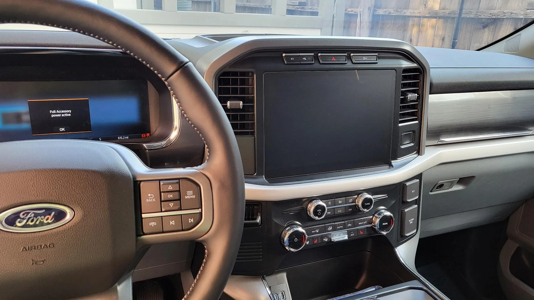 Ford F-150 Lightning Installed screen protector and 13" antenna 20220728_190401