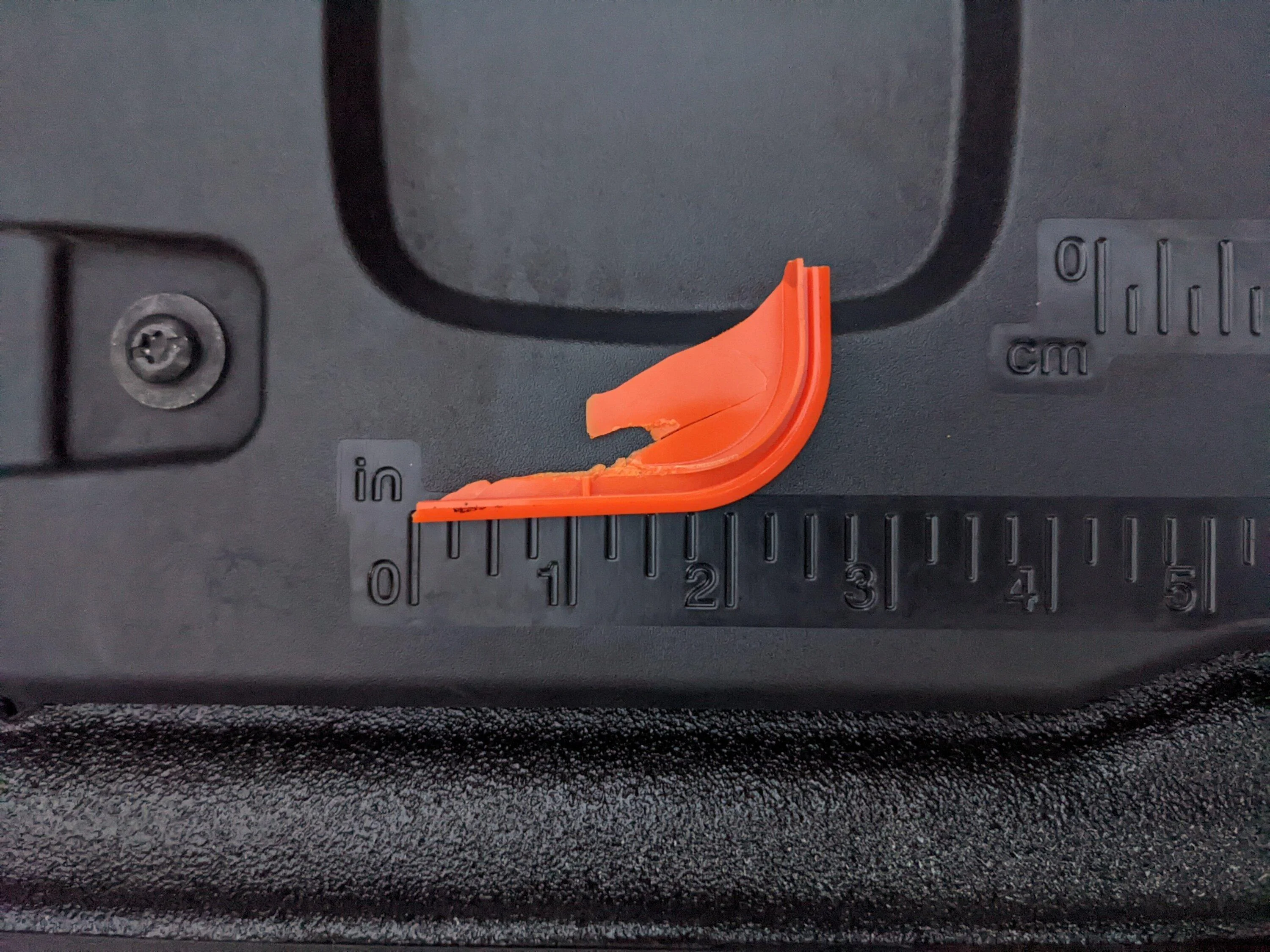 Ford F-150 Lightning Mysterious broken orange plastic part PXL_20220731_003254498