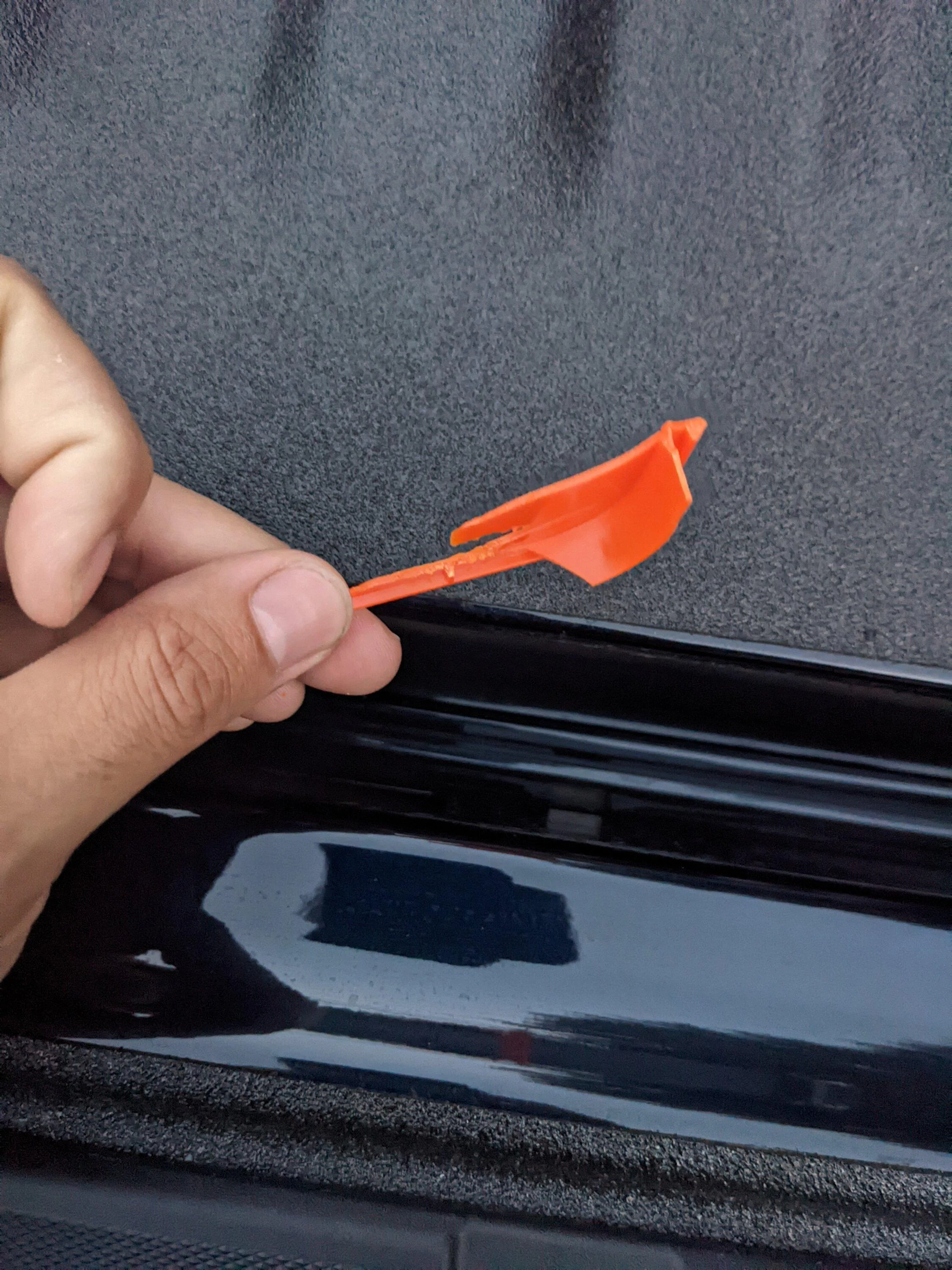 Ford F-150 Lightning Mysterious broken orange plastic part PXL_20220731_003219337