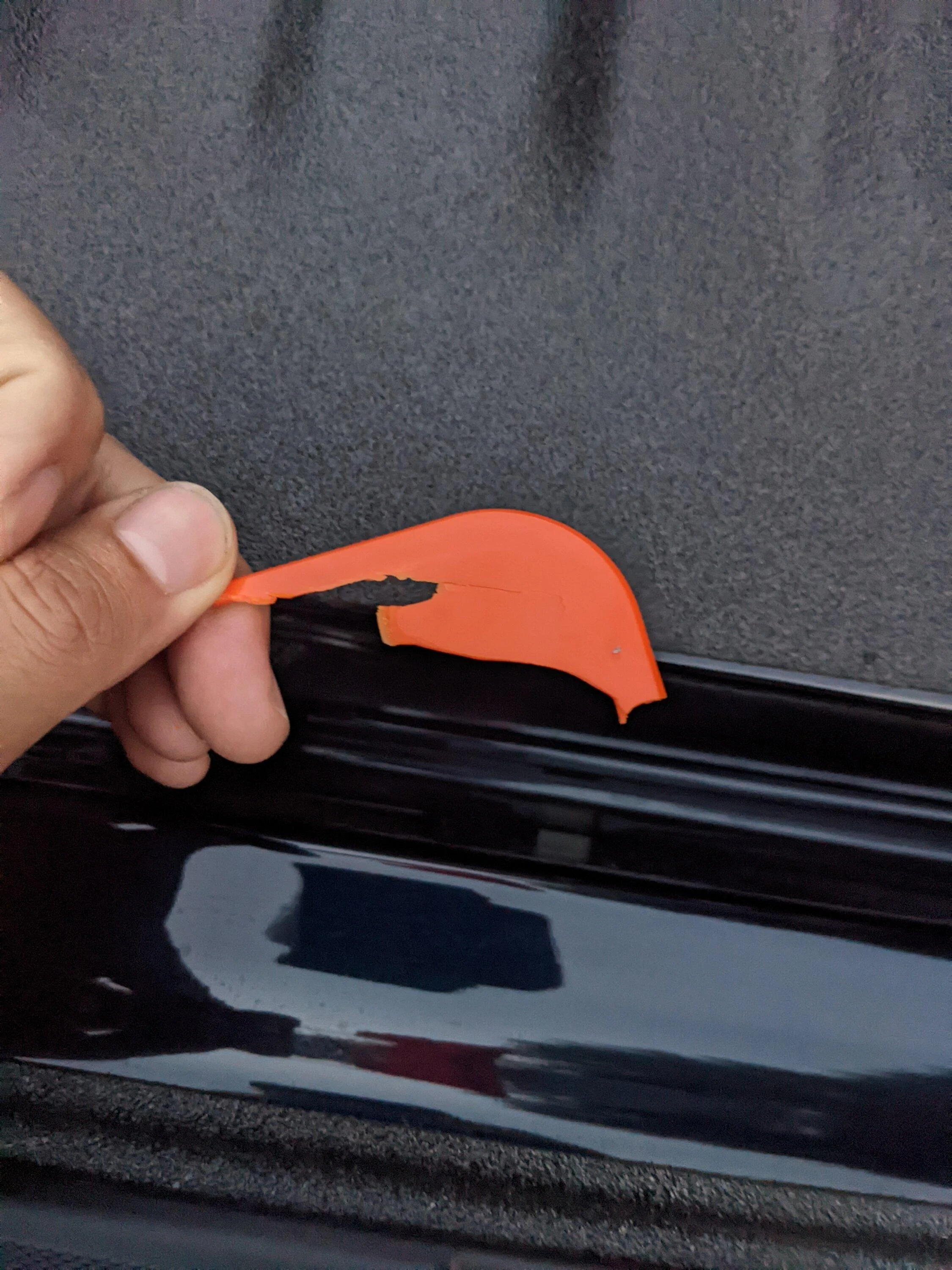 Ford F-150 Lightning Mysterious broken orange plastic part PXL_20220731_003221786