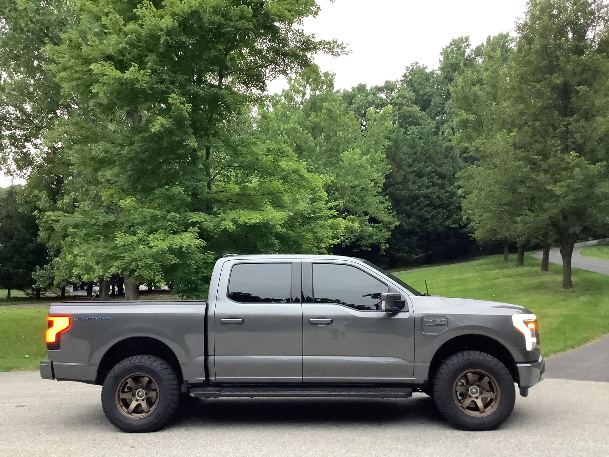 Ford F-150 Lightning Lightning Platinum on 18" Rays Wheels + 275/70 General Grabber ATX + Readylift 2" front leveling kit Readylift 2%22 front leveling kit F150 Lightning Platinum on 18%22 Rays Wheels + 275:70 Genera