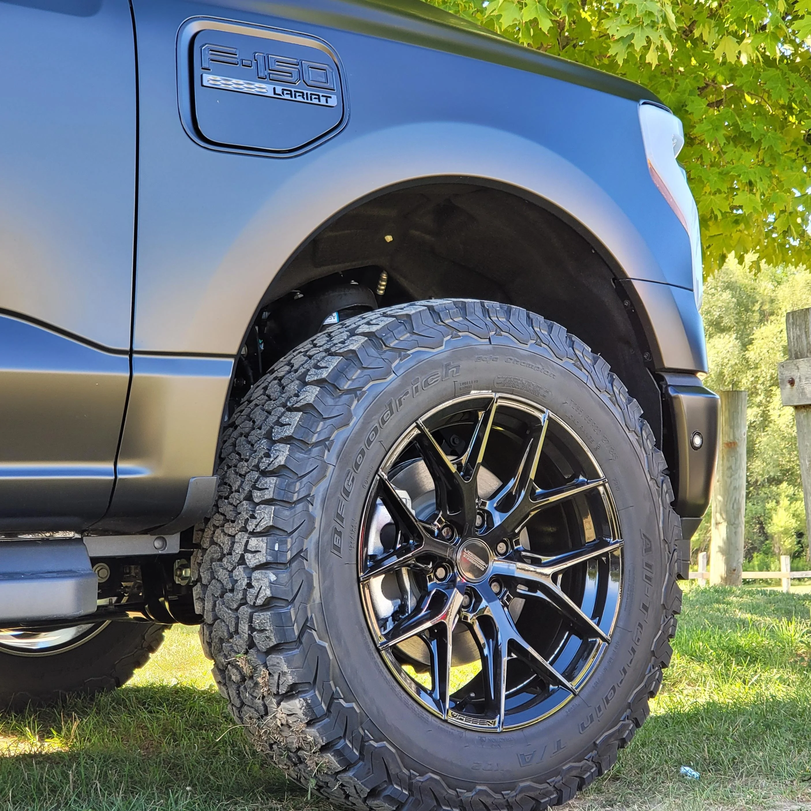Ford F-150 Lightning Iced Blue Silver Lightning Build. Mods: PPF matte finish, Line-X, gloss black painted grille, black wrapped roof, wheels 20220813_092919