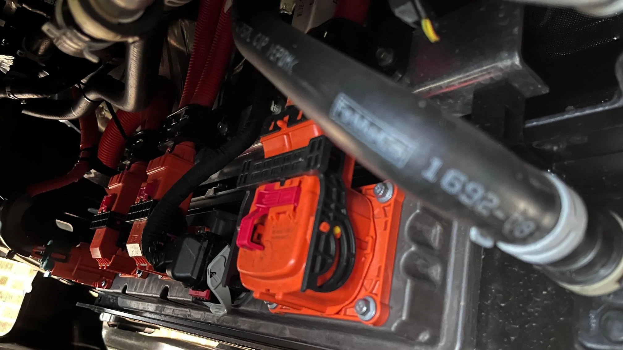 Ford F-150 Lightning Munroe's F-150 Lightning Underbody Review (Independent Rear, Trailing Arm Suspension, Etc.) BATTER PACK connections from Driver sid