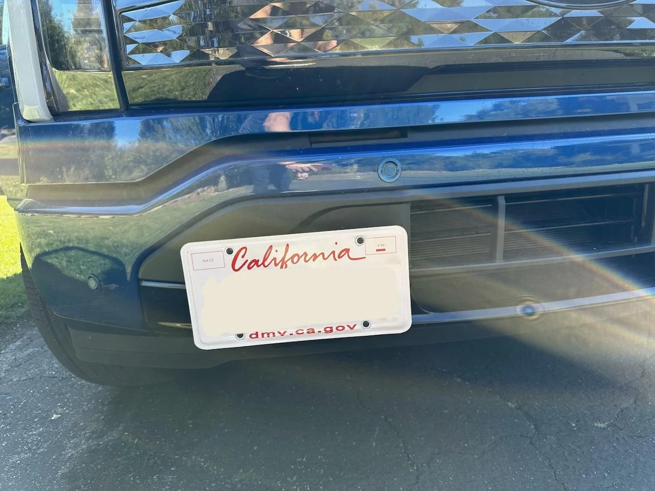 Ford F-150 Lightning Relocate Front License Plate Holder. IMG_0183