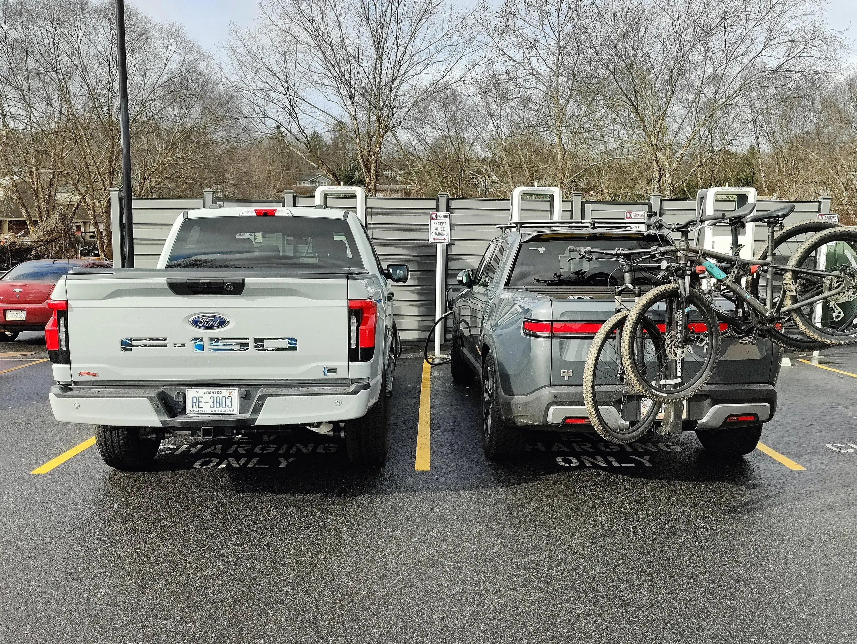 Ford F-150 Lightning Lightning pictured next to Rivian IMG20230217101312