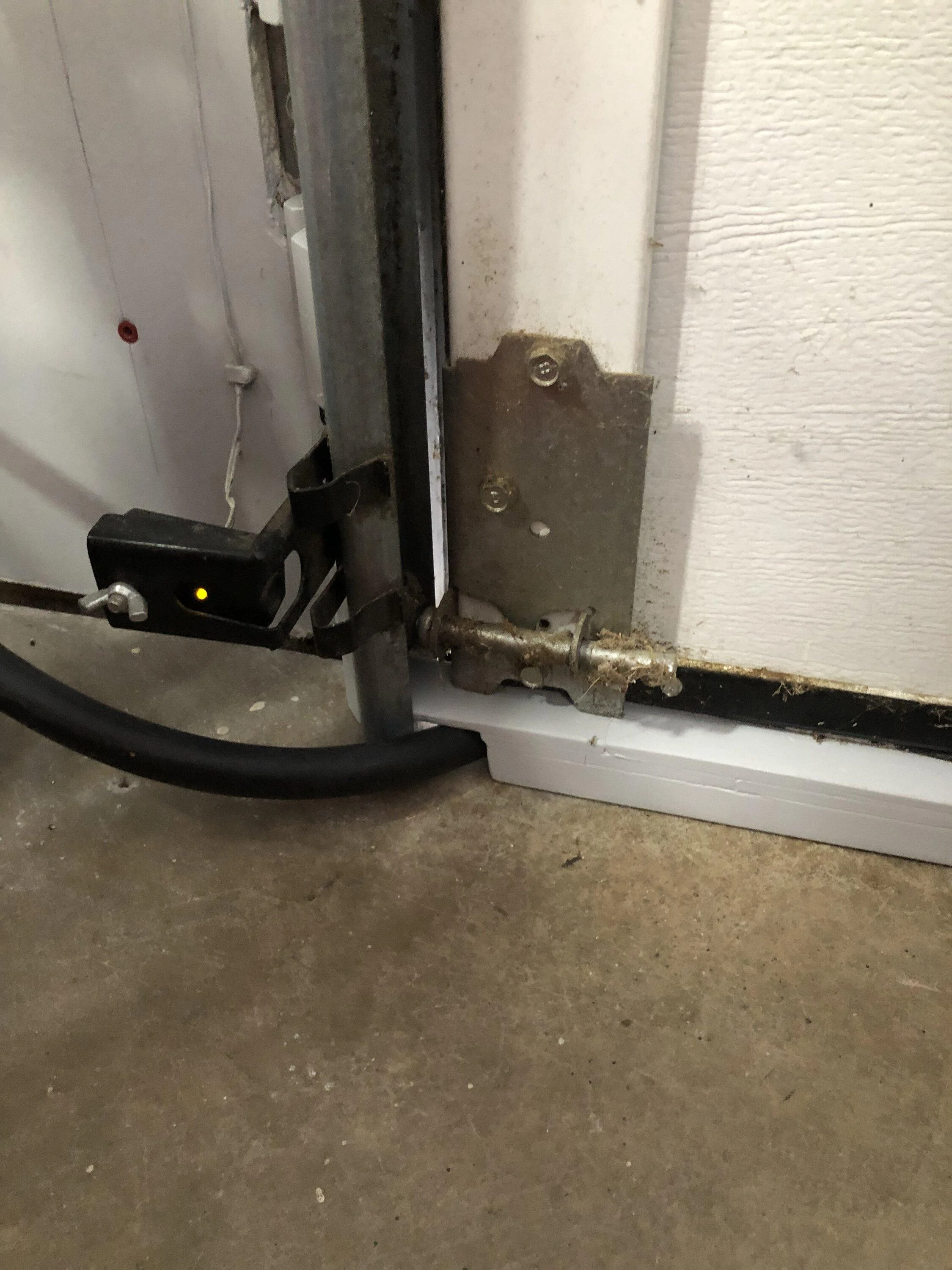 Ford F-150 Lightning FCSP - Mounted Indoors with Cord Under Garage Door Cable Guard 2
