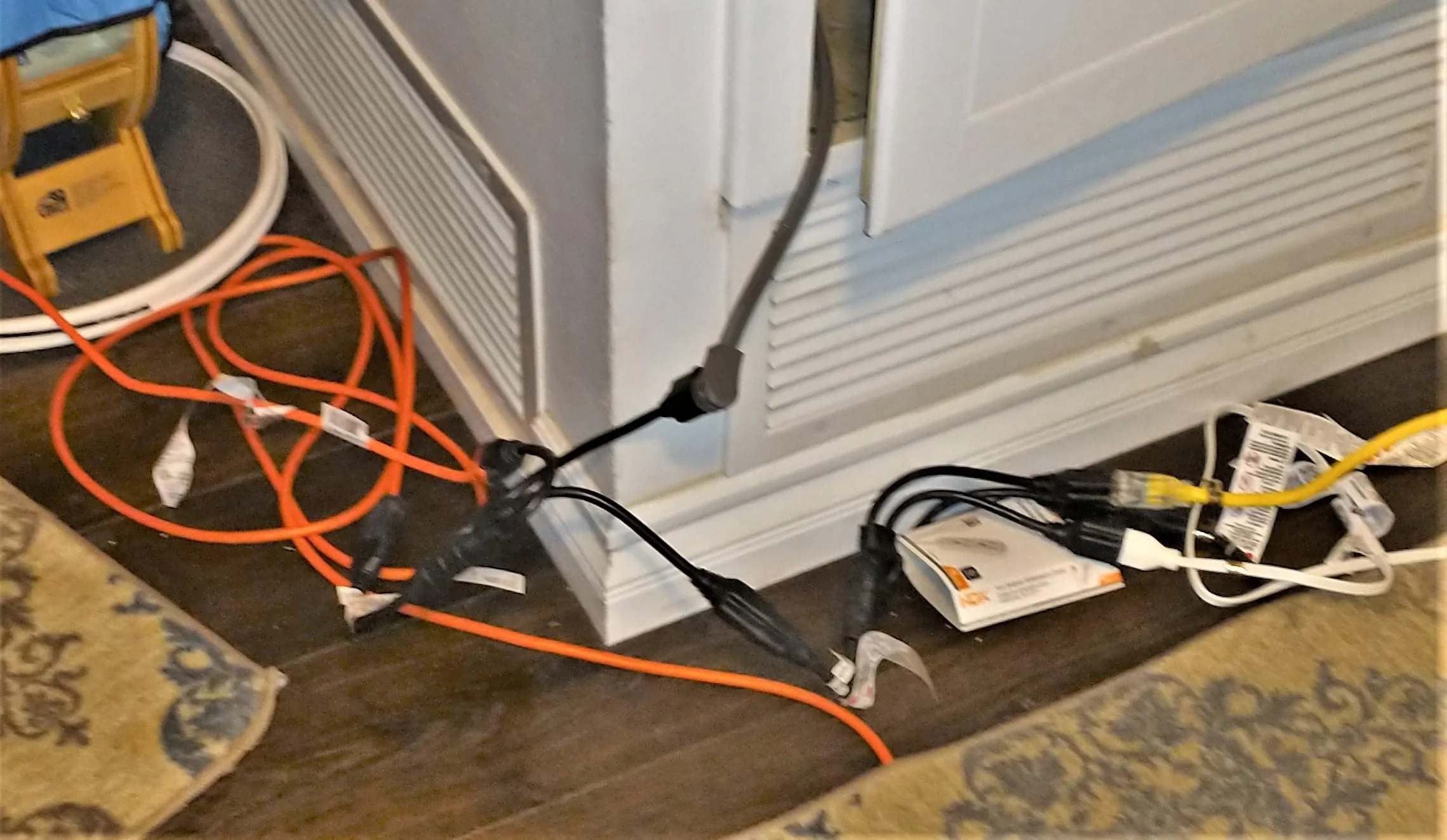 Ford F-150 Lightning An Electrician’s Lightning IMG_20230213_223223951 crop power extension cords hallway feeding furnace wifi computer room 
