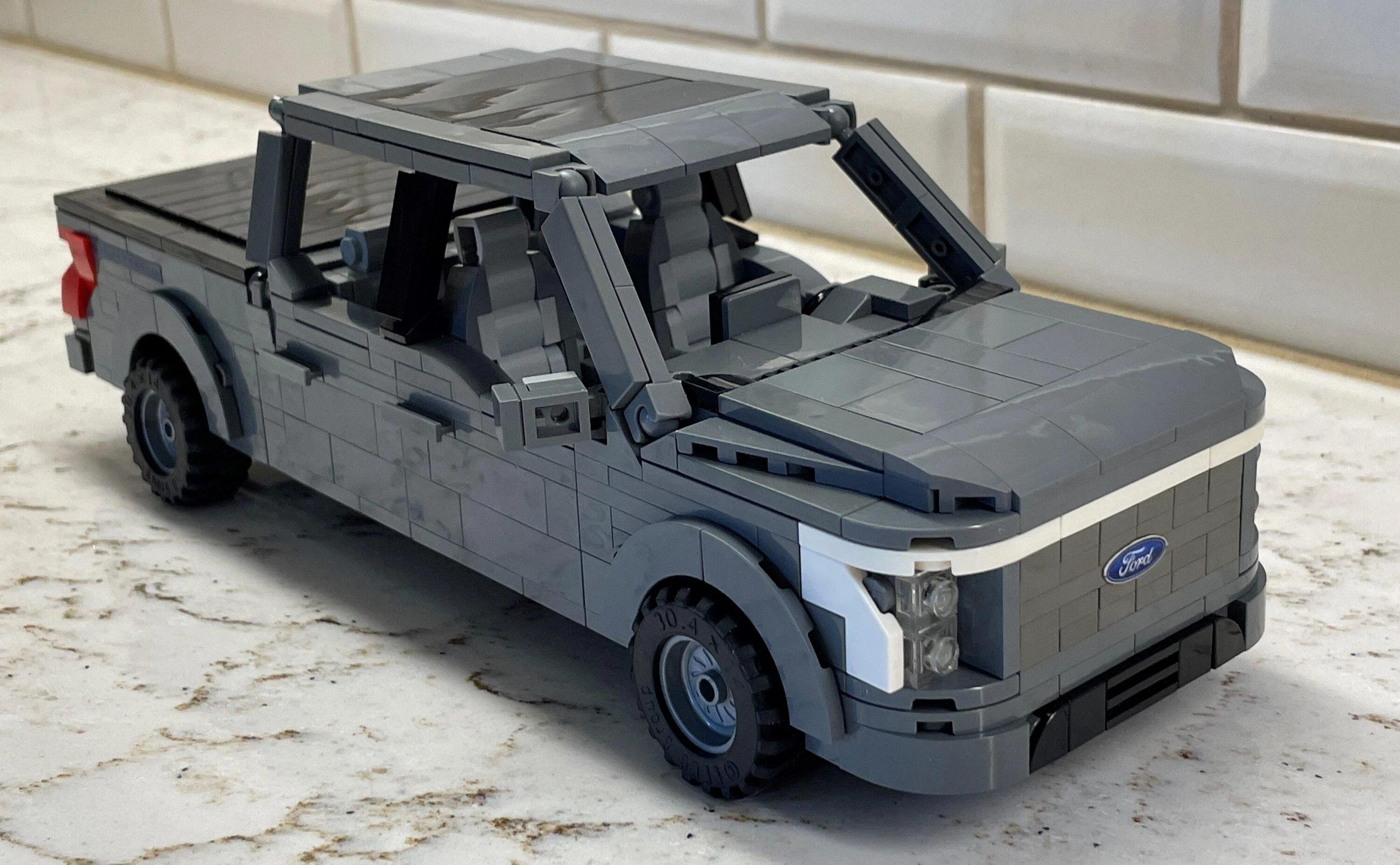 Ford F-150 Lightning Small scale LEGO model my son built 20230501_142335991_iOS