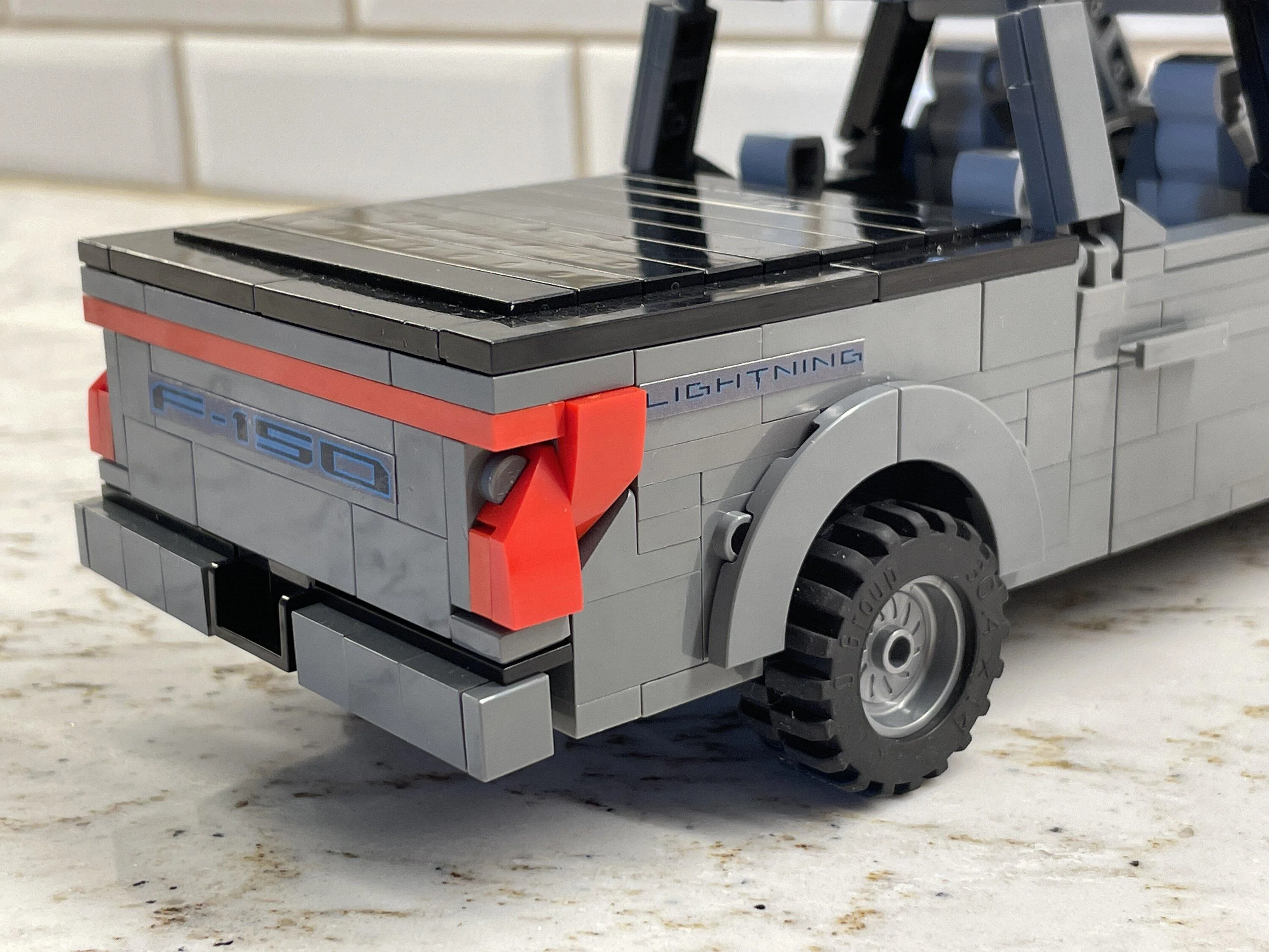 Ford F-150 Lightning Small scale LEGO model my son built 20230501_140947563_iOS