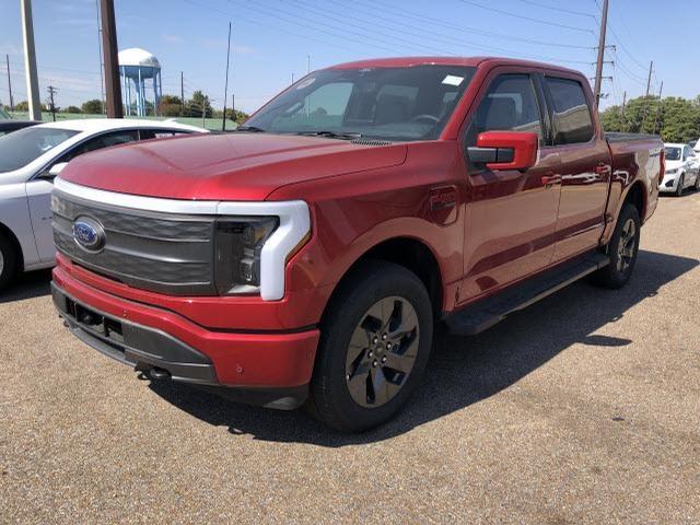 Ford F-150 Lightning 2022 Lariat ER Demo, under 200 miles, never titled, so it qualifies for the full tax credit (Rapid Red, 511A) red truck