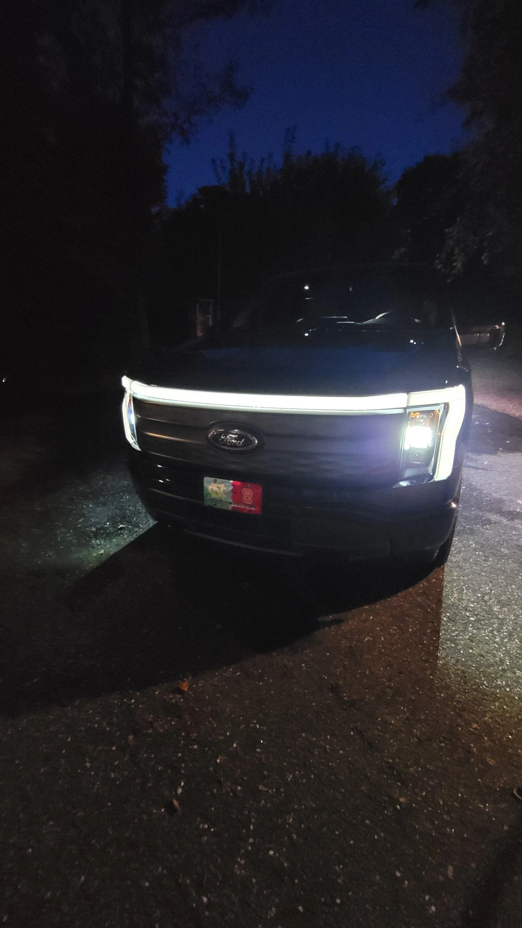 Ford F-150 Lightning Tinted front light bar on F150 Lightning using special tint made for lights 20230906_201913