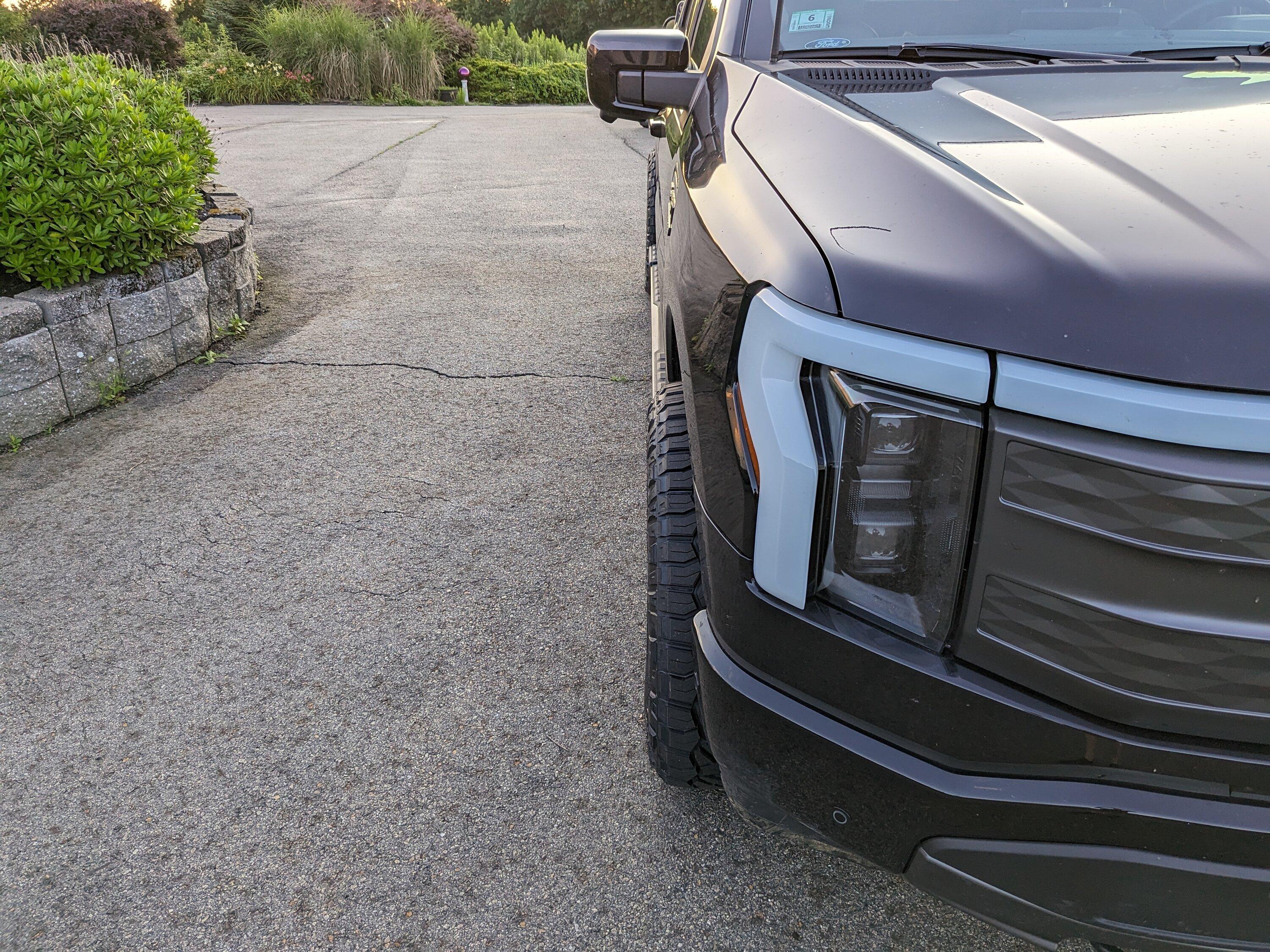 Ford F-150 Lightning Need to raise front end to clear new tires/wheels. Ok to just do the front? 2023-07-20 19.52.47