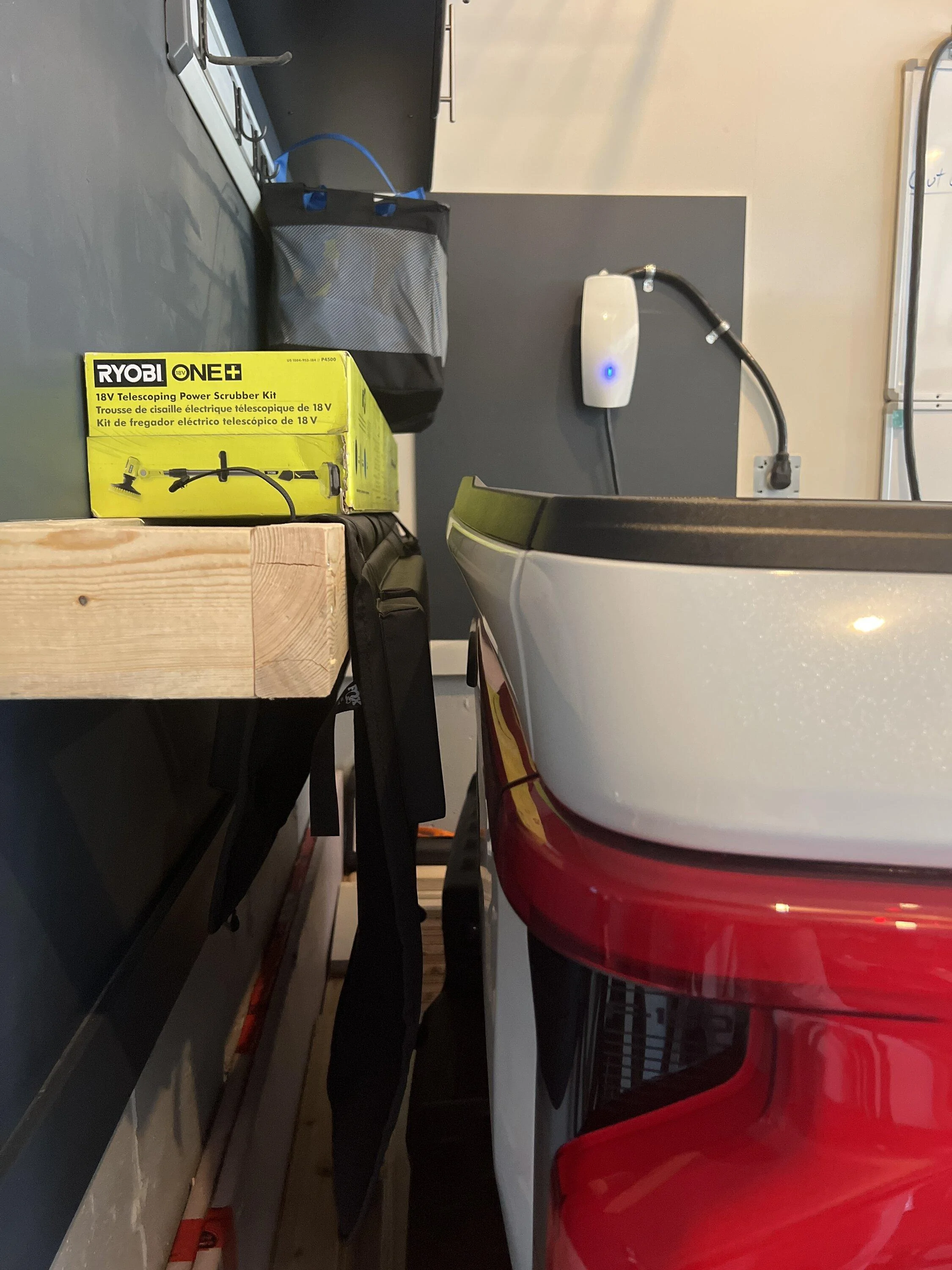 Ford F-150 Lightning Tailgate opened while in the garage - significant scratch followed imag