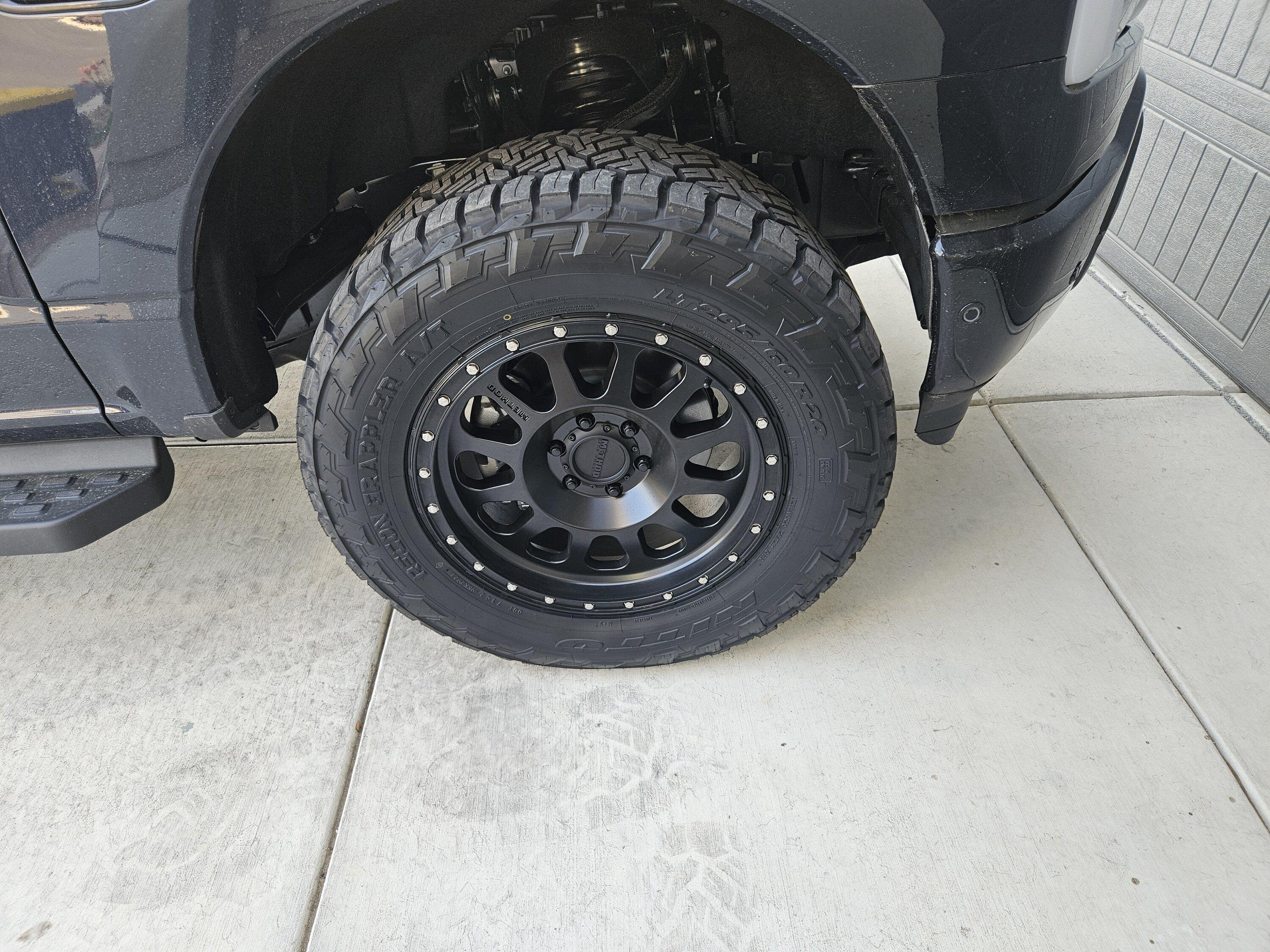 Ford F-150 Lightning 2" inch Readylift Level with 20 inch Method Wheels (+18) wrapped in 295 60 20 Recon Grapplers 17022260310046412458000111588932
