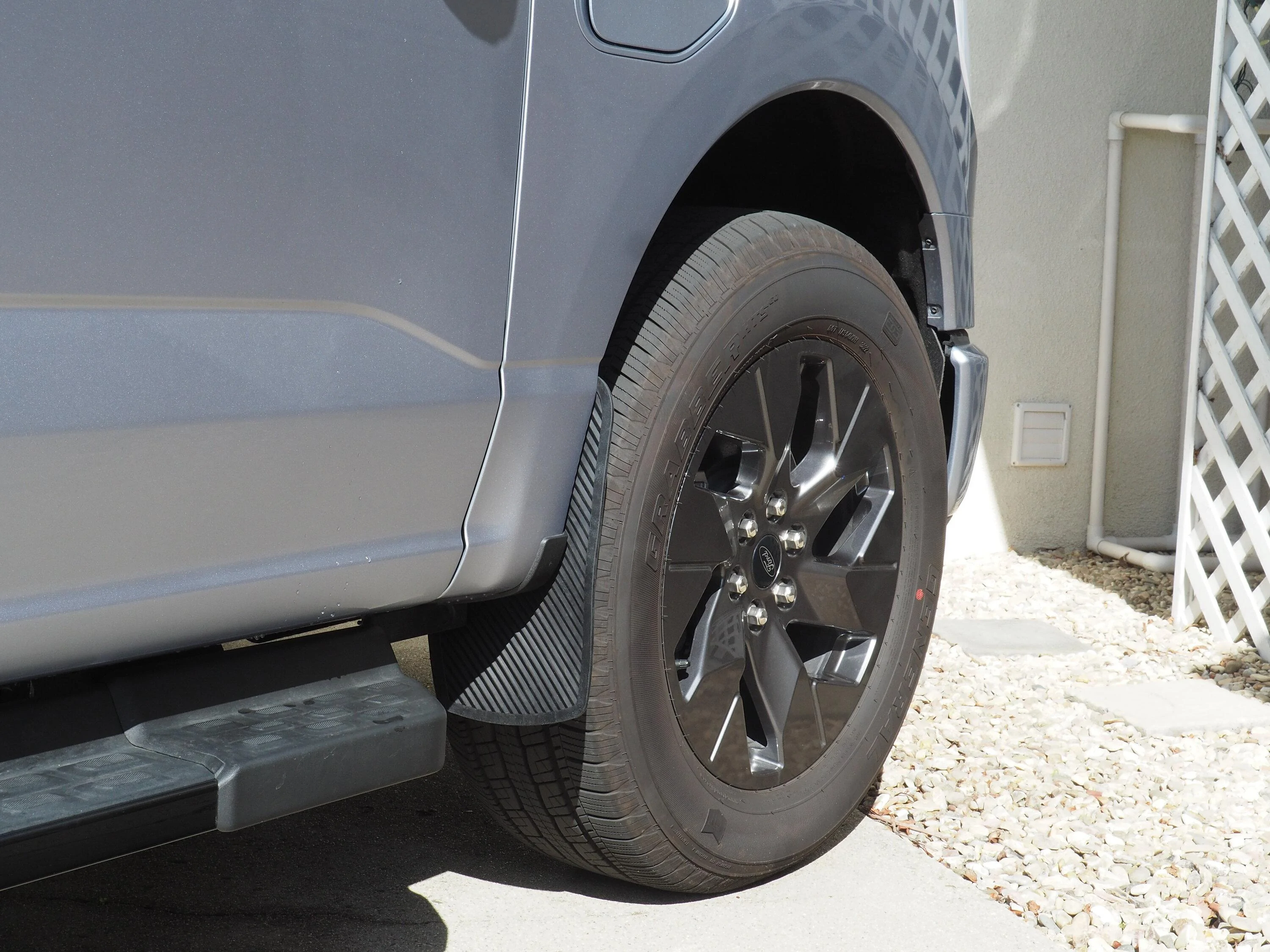 Ford F-150 Lightning Anything new in the mudflap department? W3293851 Ford F150 Lightning Xukey YS03010 flexible rubber mud flaps added in front