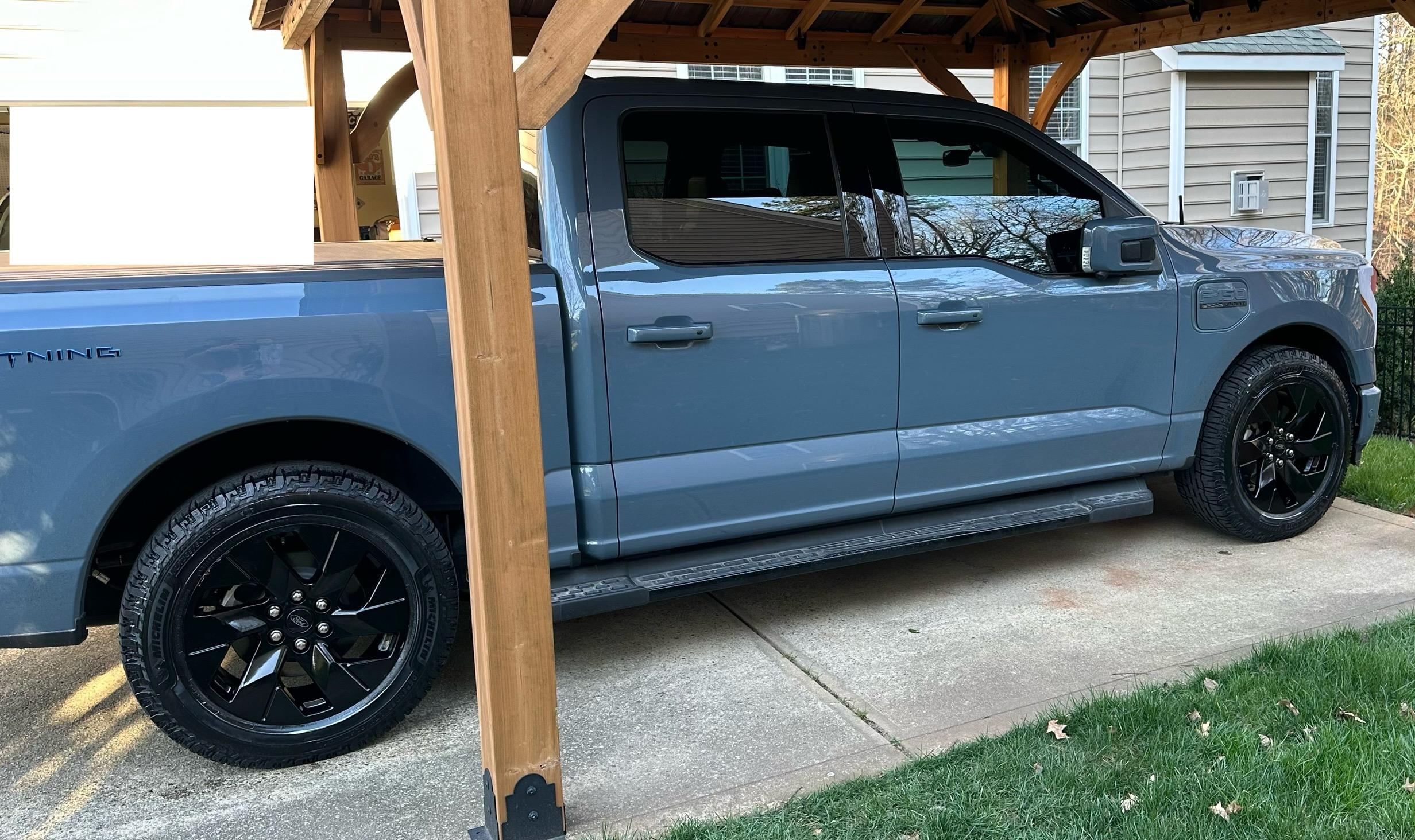 Ford F-150 Lightning Gloss Black powdercoat OEM Lariat wheels looks fantastic! IMG_1053