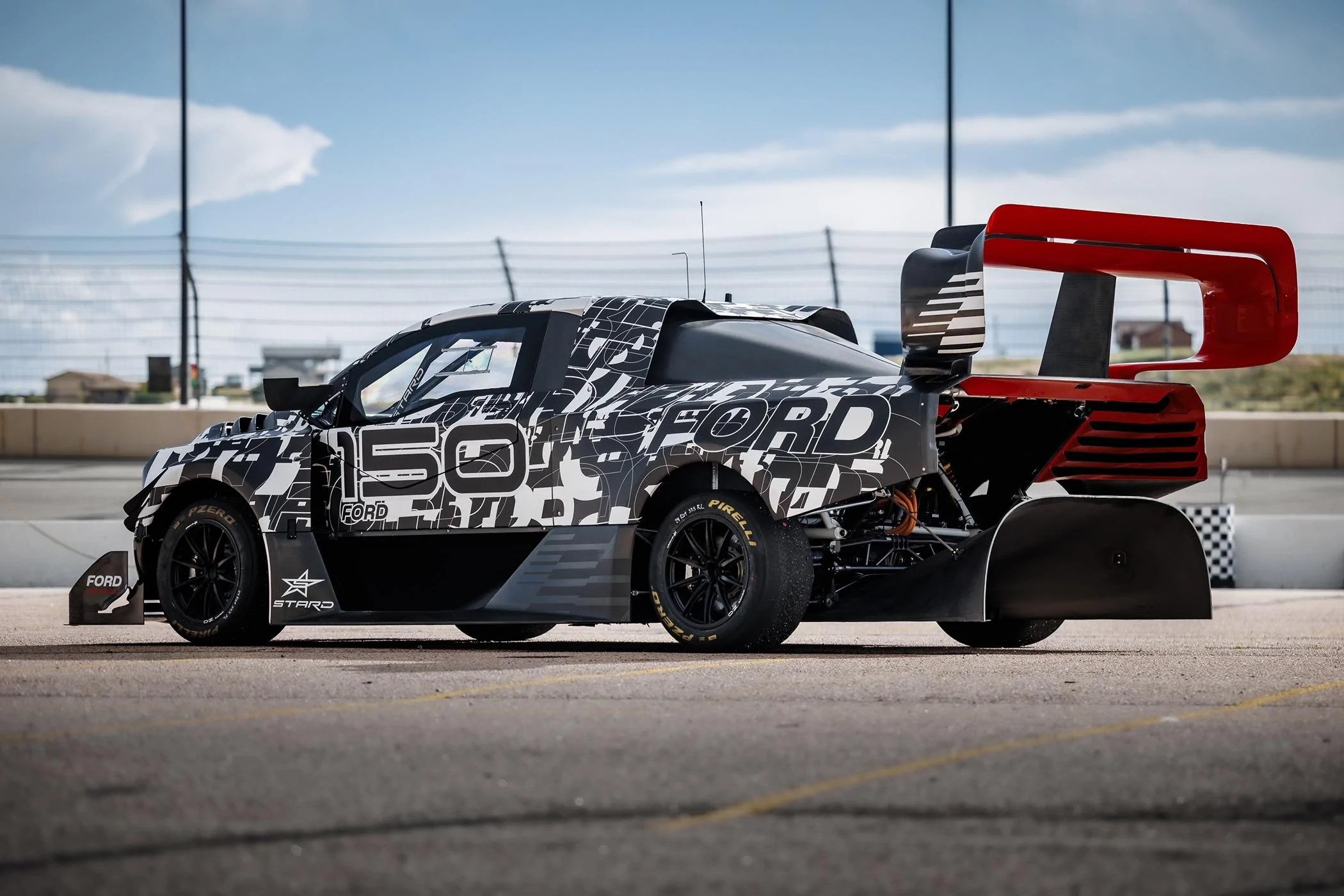 Ford F-150 Lightning First Look: Ford F-150 Lightning Supertruck EV Demonstrator SuperTruck Camo Wing
