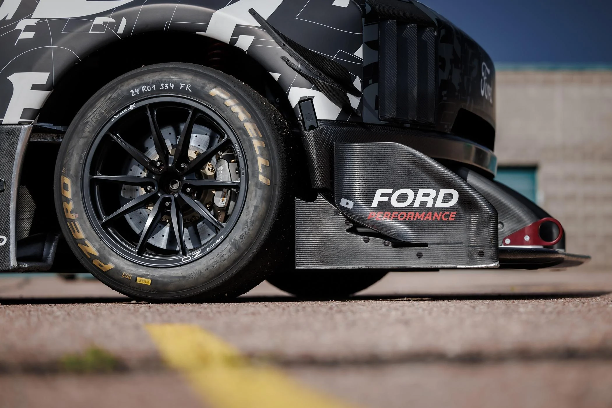 Ford F-150 Lightning First Look: Ford F-150 Lightning Supertruck EV Demonstrator SuperTruck Camo Front Featur
