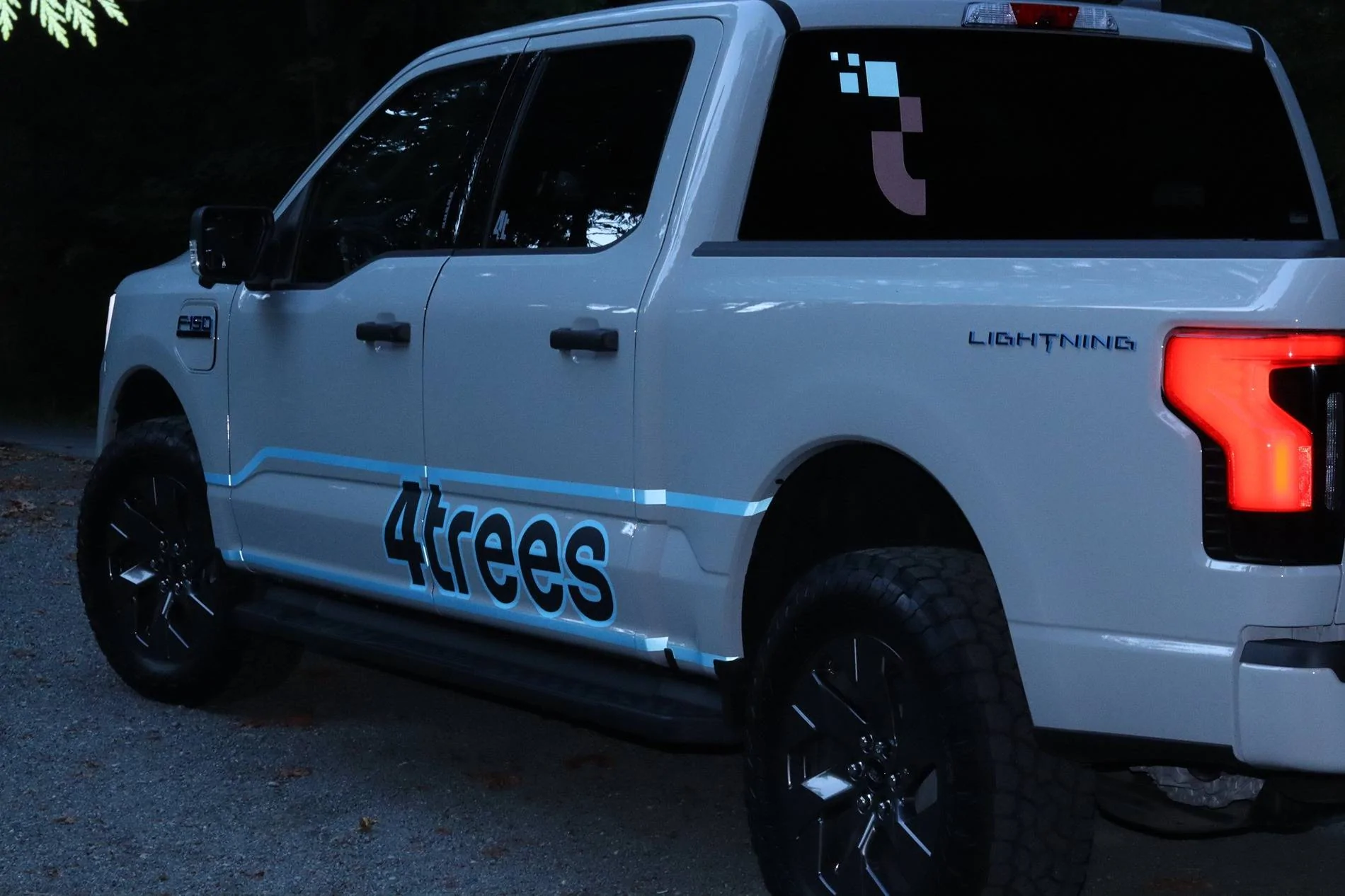Ford F-150 Lightning 2024 F-150 Lightning XLT on Toyo Open Country A/T 3 tires + electric blue accents IMG_6498