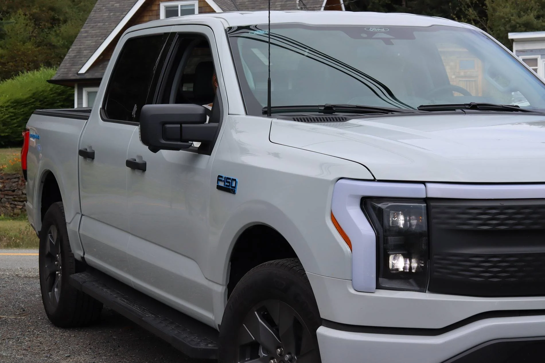Ford F-150 Lightning 2024 F-150 Lightning XLT on Toyo Open Country A/T 3 tires + electric blue accents IMG_6361