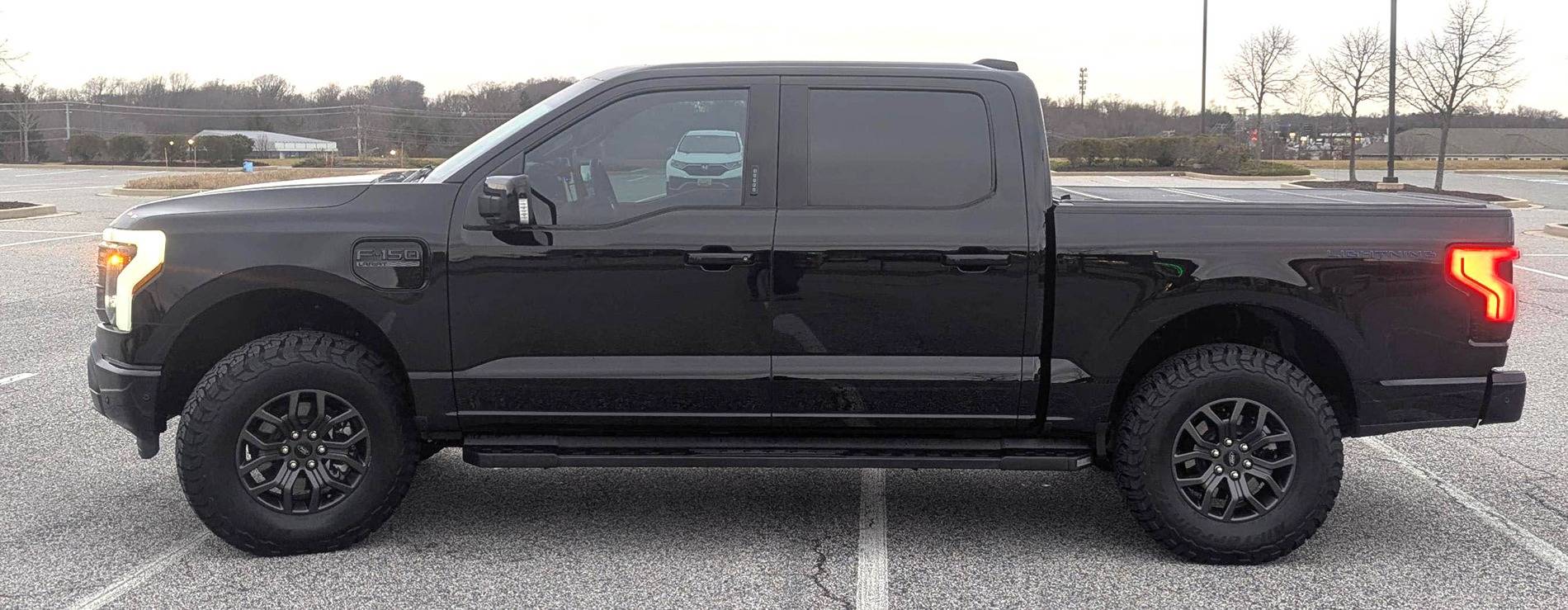 Ford F-150 Lightning Tremor wheels with KO3 tires + Eibach level kit installed After (1).JPG