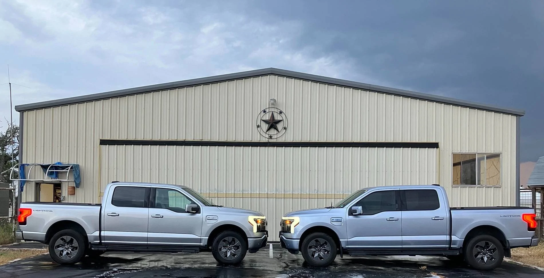 Ford F-150 Lightning Iced Blue Silver vs Iconic Silver F-150 Lightning Side-by-Side Comparison Photos Sparky & BigBlue wLights @ TLR 6-09-24