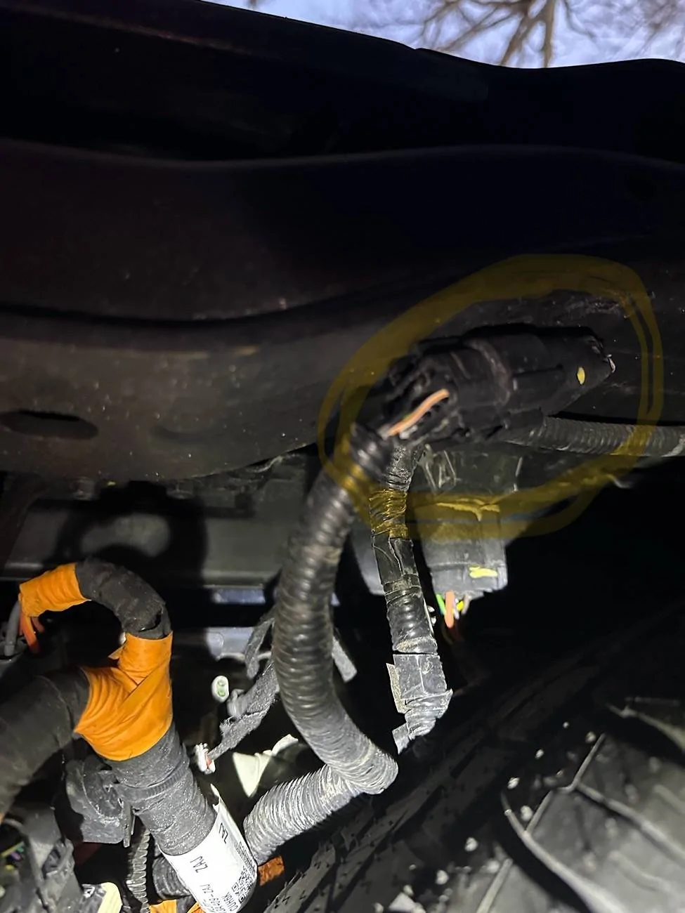 Ford F-150 Lightning Hanging wire under rear bumper IMG_6194