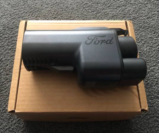 Ford F-150 Lightning Charging Adaptor ( NACS TO CCS1 ). Condition is New - $200 58F3109E-6709-42A9-8A80-B587E70761F3