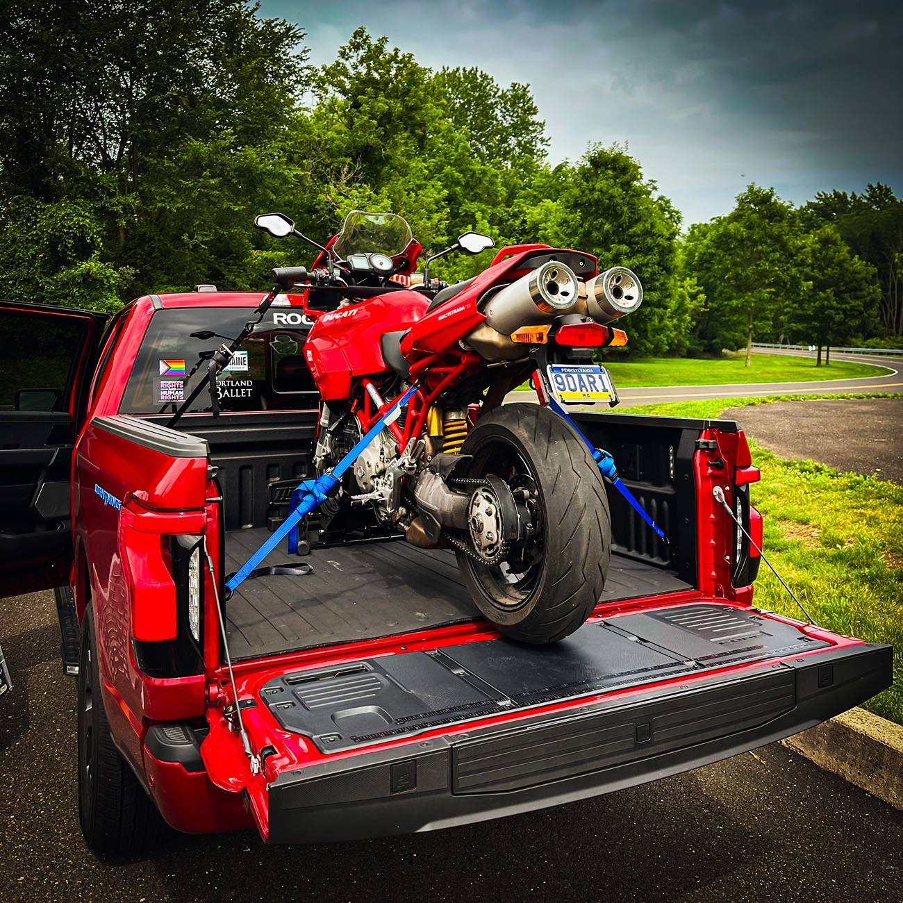 Ford F-150 Lightning Anyone haul a motorcycle yet in the bed? IMG_2169