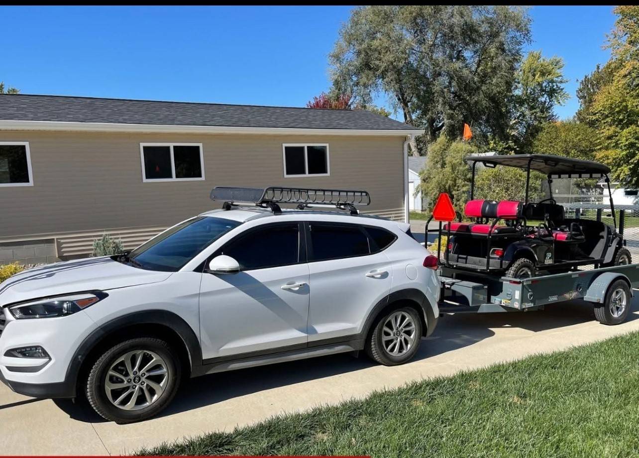 Ford F-150 Lightning Talk me out of getting this Lariat car and trailer
