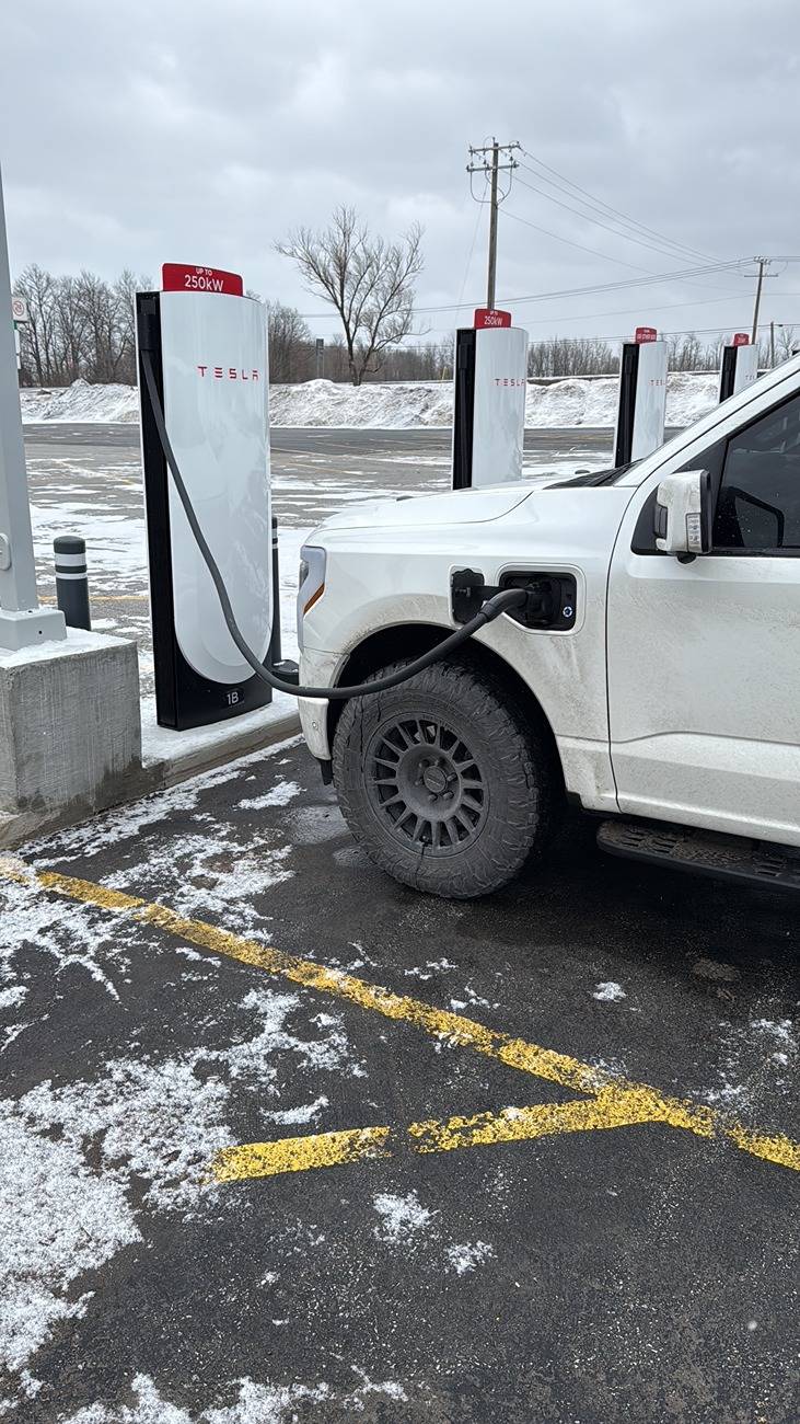 Ford F-150 Lightning '23 Tri-Star White Metallic Lariat ER - Method 18"s Toyo OC AT3's Champlain Charge.JPG