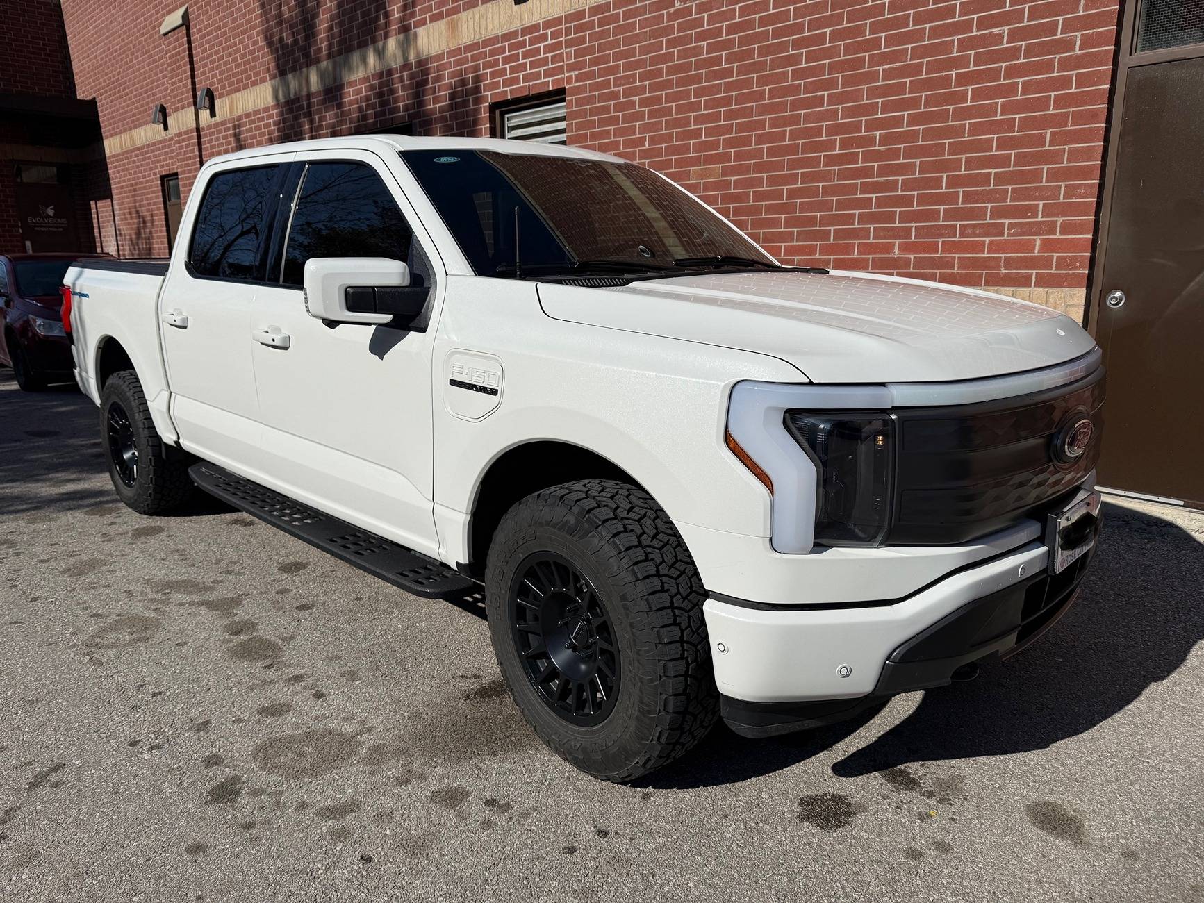 Ford F-150 Lightning '23 Tri-Star White Metallic Lariat ER - Method 18"s Toyo OC AT3's Clean1