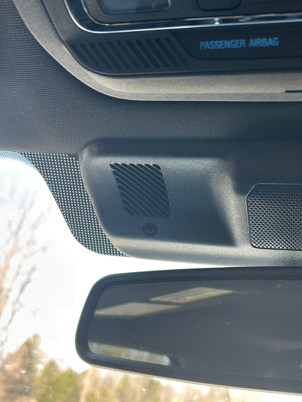 Ford F-150 Lightning Sensor above rear view mirror. IMG_1205