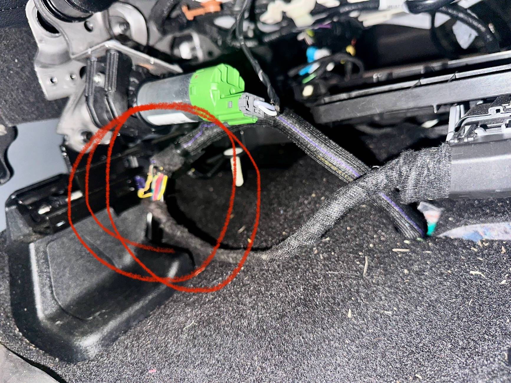 Ford F-150 Lightning Mangled wiring harness underneath driver seat IMG_8167