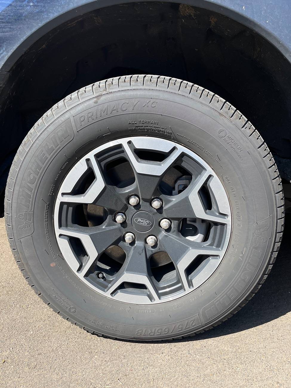 Ford F-150 Lightning Has anyone put 295/70R18 BFG KO2s on stock XLT 18” wheels with 2” leveling kit? image