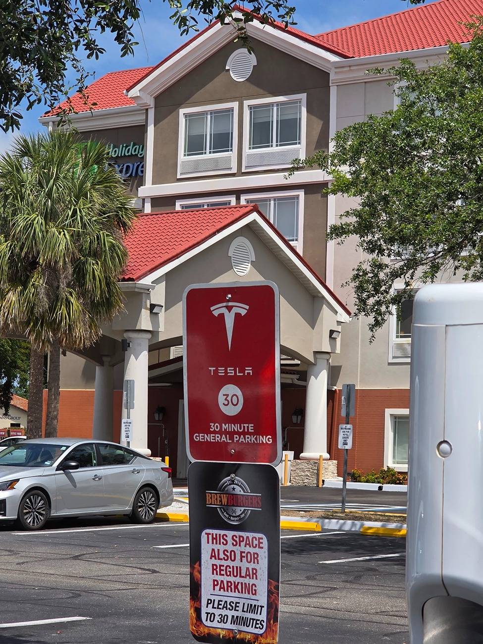 Ford F-150 Lightning Frist time using Tesla DC charger, work with Ford pass. Check out this sign in photo is this normal. 1000000495