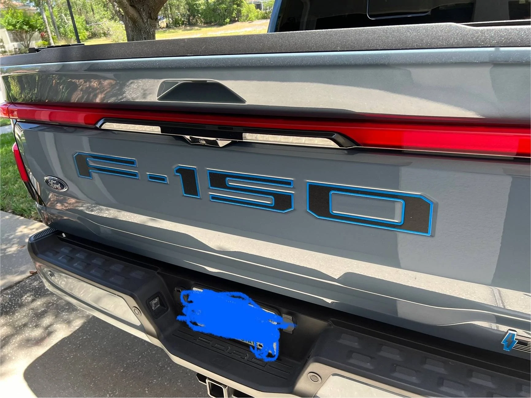 Ford F-150 Lightning Azure gray owners with tailgate decal IMG_5061