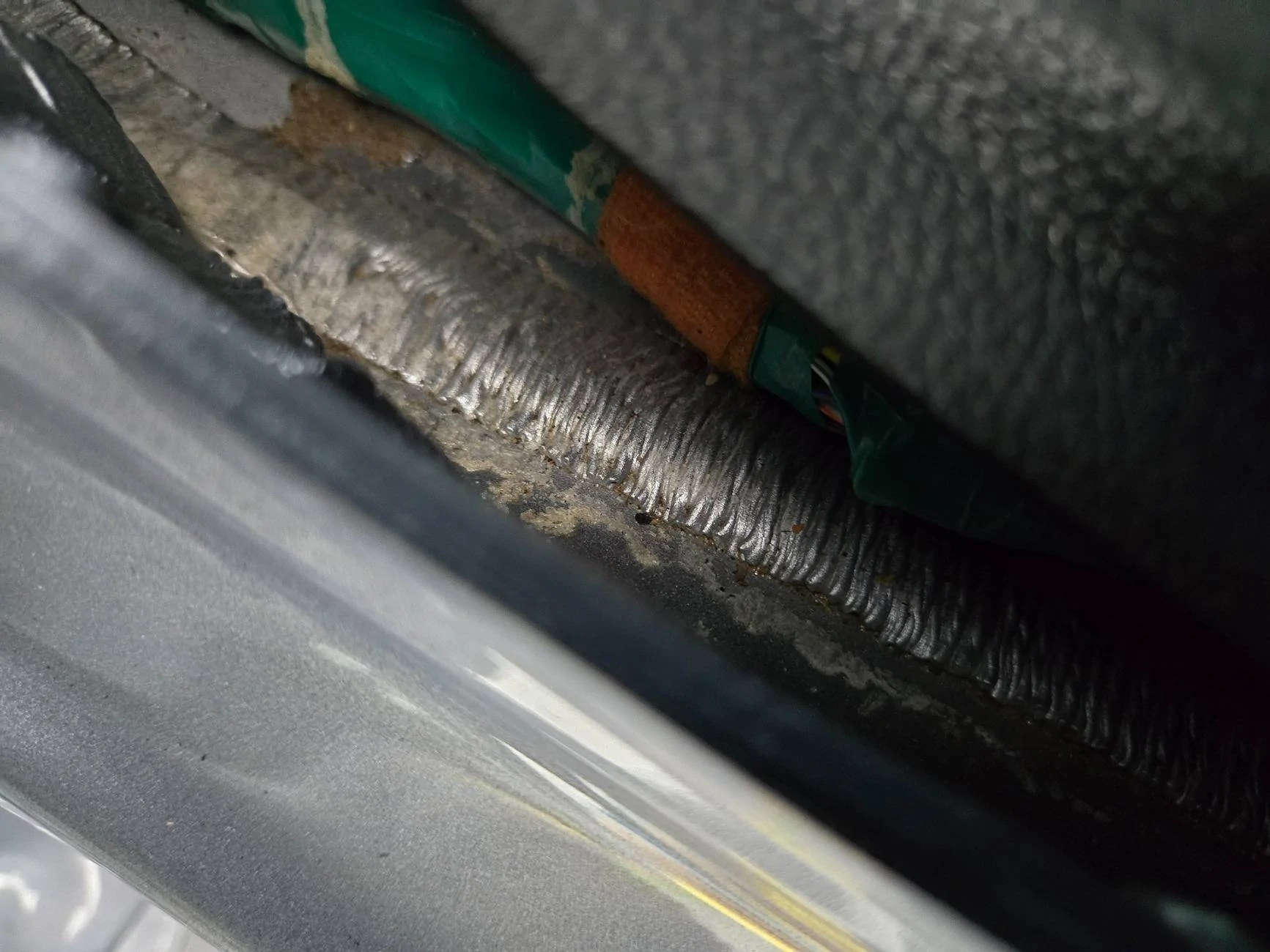 Ford F-150 Lightning PSA: Check under your door sill trim if you live in the rust belt!! 20250427_152126