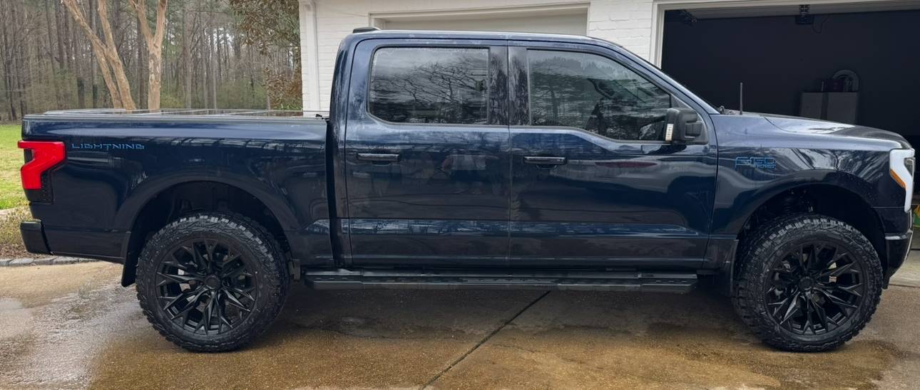 Ford F-150 Lightning Leveled Lightnings ? Anybody got before and after pics? IMG_6841