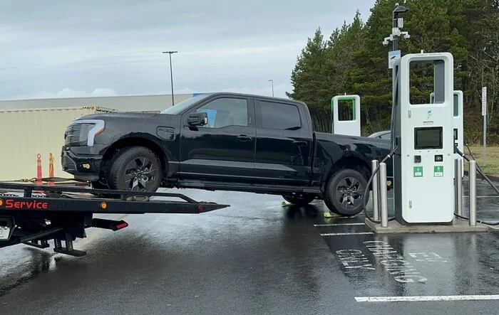 Lightning towed away from Electrify America charging station “after the EA charger fried my truck”