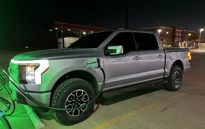 2" level kit and 295/70R18 tires installed on Lightning Lariat ER