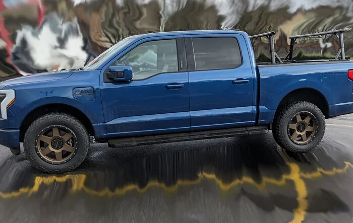 Vantech P3000 clamp-on rack works nicely. Also mounted Raceline 946BZ wheels and Mickey Thompson Baja Boss tires