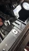 Keyfob sensor plug below passenger rear cup holder.webp